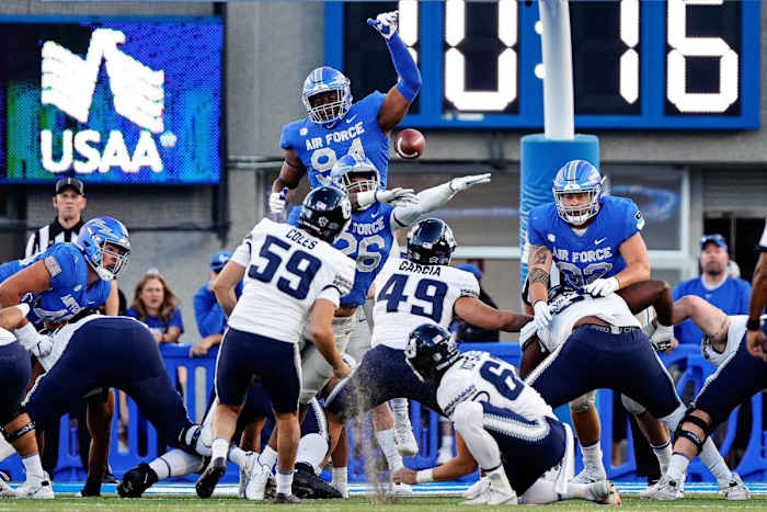 Air Force defensive tackle Jordan Jackson (94) blocks the extra attempt of Utah State kicker Connor Coles (59). Mandatory Credit: Isaiah J. Downing-USA TODAY